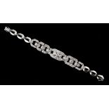 A Swedish 18ct white gold diamond link bracelet, the estimated total diamond weight 5.11 carats, 6.