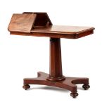 property of a gentleman - an early Victorian mahogany adjustable pedestal reading table, with