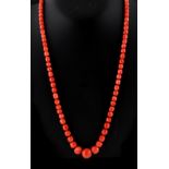 A Victorian faceted coral bead necklace, with eighty-seven individually strung graduated beads,