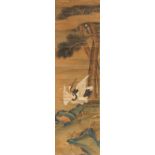 A 19th century Chinese painting on silk depicting a red crowned crane by a pine tree & rocks, the