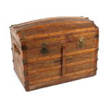 Property of a deceased estate - a late 19th century tooled leather domed top trunk with fitted