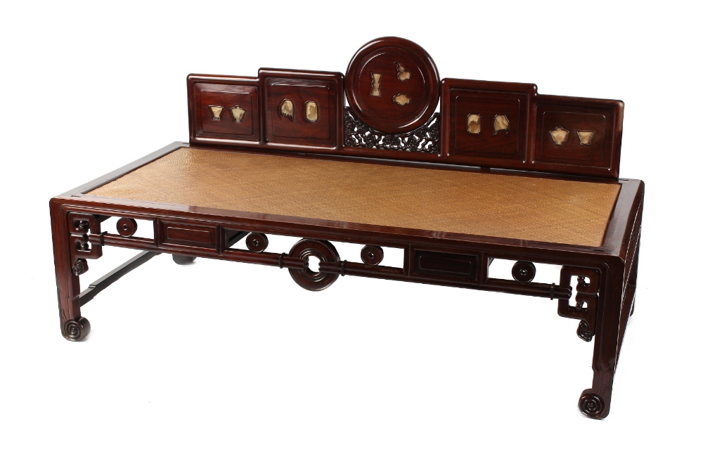 A late 19th century Chinese carved hongmu & cane panelled day bed, with dream stone or Dali marble