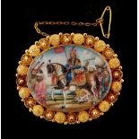 Property of a lady - a 19th century Indian unmarked gold cannetille oval framed brooch with