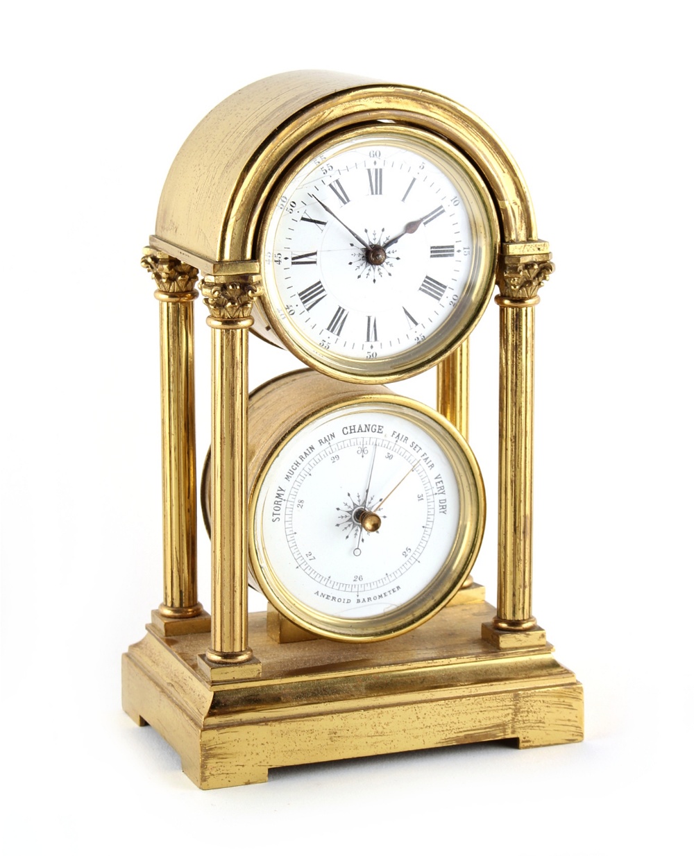 Property of a gentleman - a late 19th / early 20th century brass portico desk clock with drum
