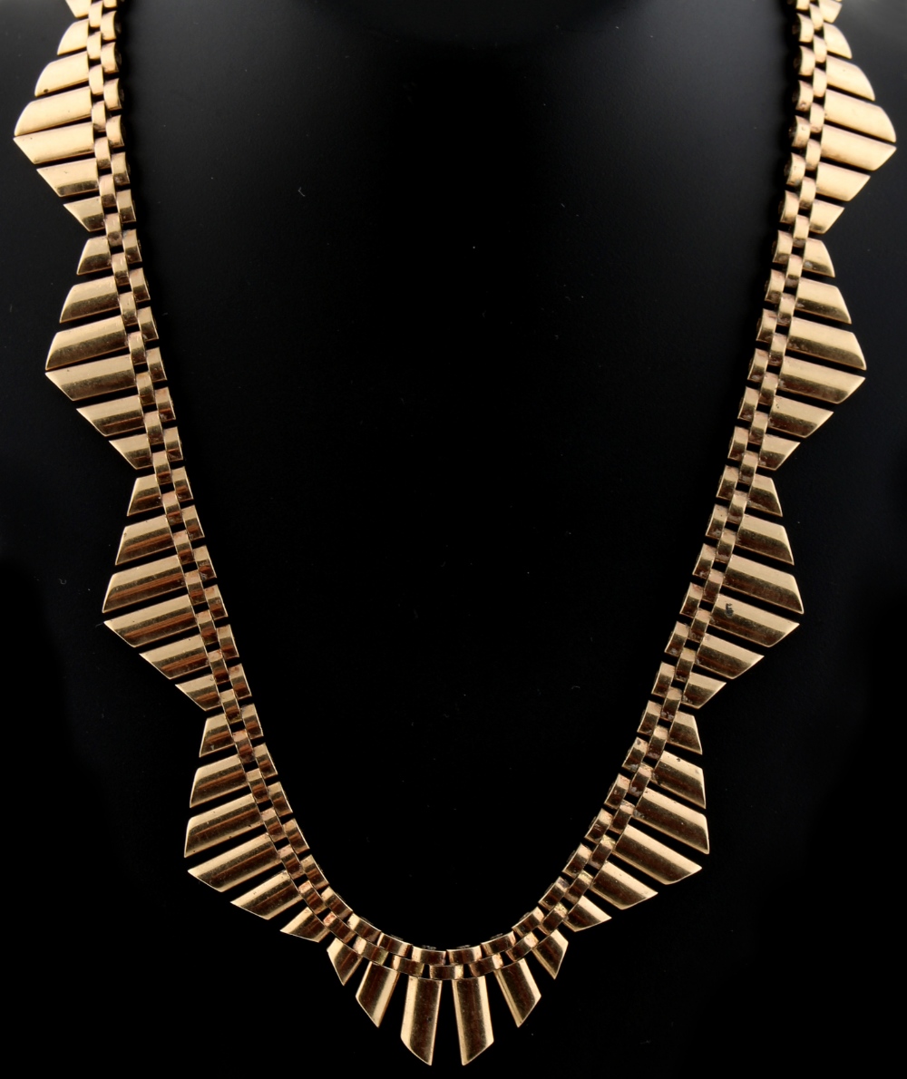 Property of a lady - a 9ct gold fringe necklace, approximately 16.5ins. (42cms.) long, approximately