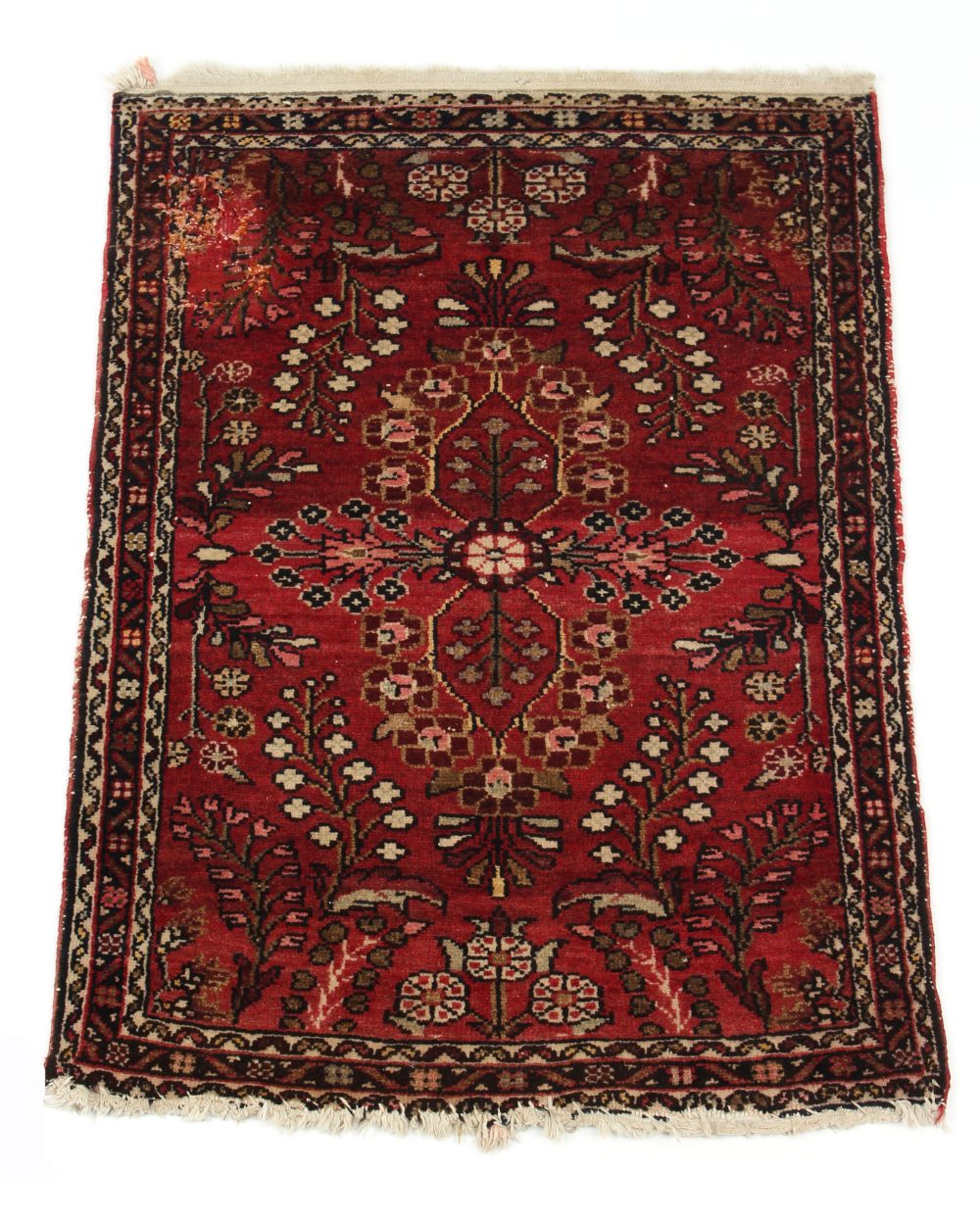 A Tabriz woollen hand-made rug with red ground, 40 by 29ins. (102 by 74cms.)