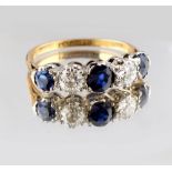 An 18ct yellow gold sapphire & diamond five stone ring, the estimated total sapphire weight 1.26