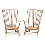 Property of a deceased estate - a pair of Ercol light coloured stick-back low elbow chair frames (