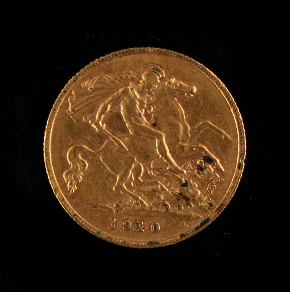 Property of a deceased estate - gold coin - an Edward VII 1910 gold half sovereign.