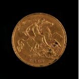 Property of a deceased estate - gold coin - an Edward VII 1910 gold half sovereign.