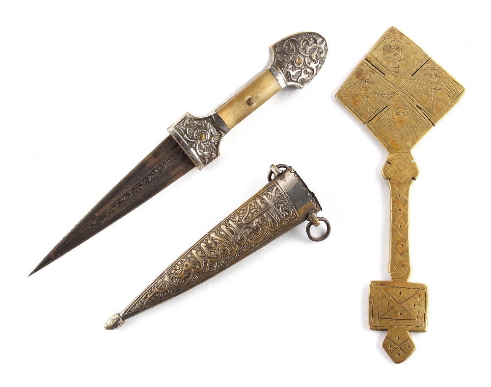 Property of a lady - a Caucasian dagger in sheath, 8.85ins. (22.5cms.) long (overall); together with