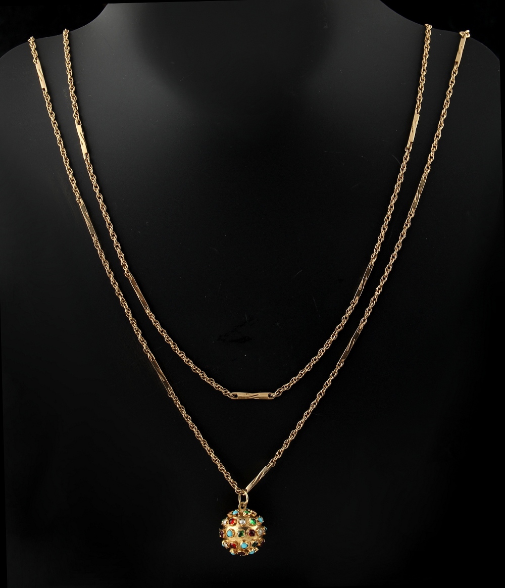 Property of a lady - a long 9ct gold guard chain, 56.75ins. (144cms.) long, with 9ct gold ball