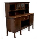 Property of a gentleman - an early 20th century Arts & Crafts oak two-part dresser, 72.25ins. (183.