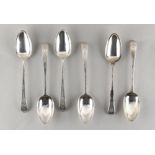 Property of a deceased estate - a set of four George III silver table spoons with bright cut