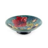 Property of a deceased estate - a Moorcroft Hibiscus pattern low pedestal dish or footed shallow