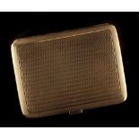 Property of a lady - a 9ct gold cigarette case with engine turned decoration, 4.2ins. (10.7cms.)