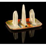 Property of a lady - a Clarice Cliff Bizarre Windbells pattern two-division toast rack, 4.85ins. (