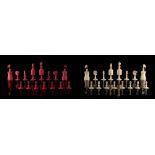 Property of a gentleman - a 19th century English bone 'Old English' pattern chess set, one red