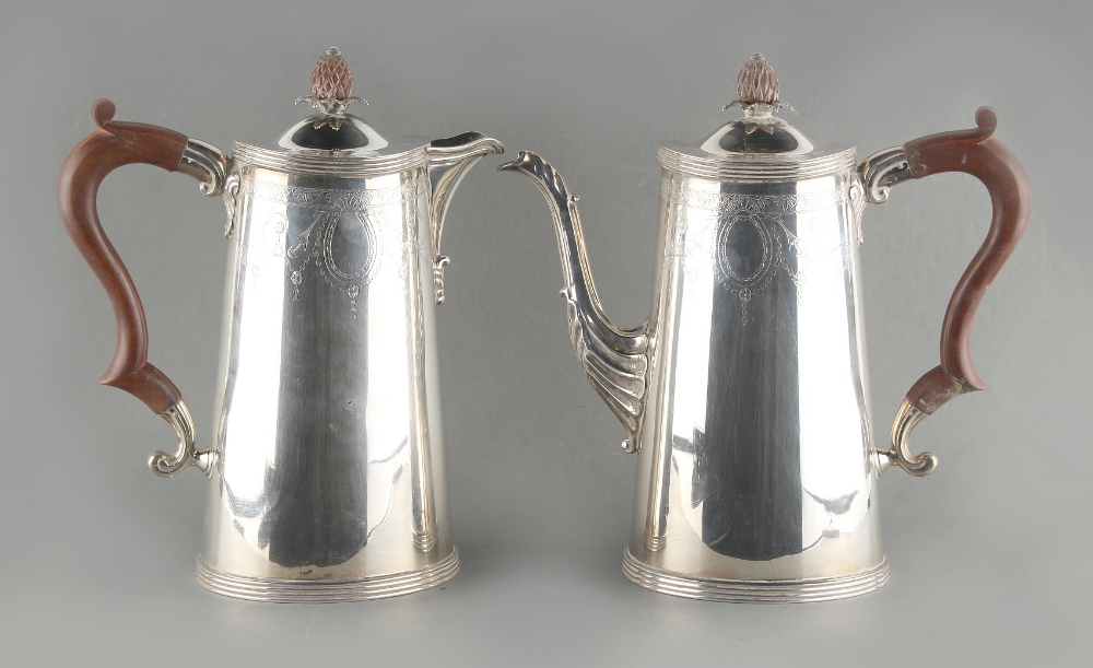 Property of a lady - a silver coffee pot and matching hot water jug, each of tapering oval form with