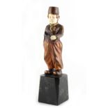 Property of a lady - an Art Deco bronze & ivory figure of a Dutch boy holding a clog, unsigned,