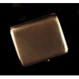 Property of a lady - a 9ct gold cigarette case, with engine turned decoration, 3.15ins. (8cms.)