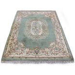 Property of a gentleman - a hand knotted wool carpet, late 20th century, with greyish green