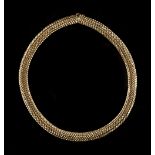 Property of a lady - an 18ct yellow gold feather link necklace, 17ins. (43cms.) long,