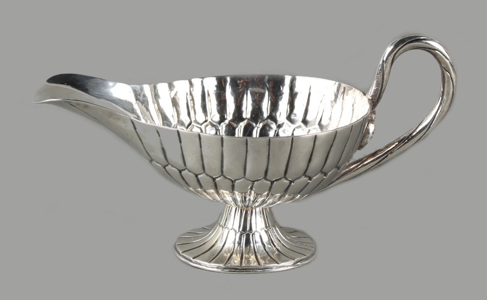 Property of a lady - a Sanborns Sterling silver sauceboat, of fluted pedestal form, the ropetwist