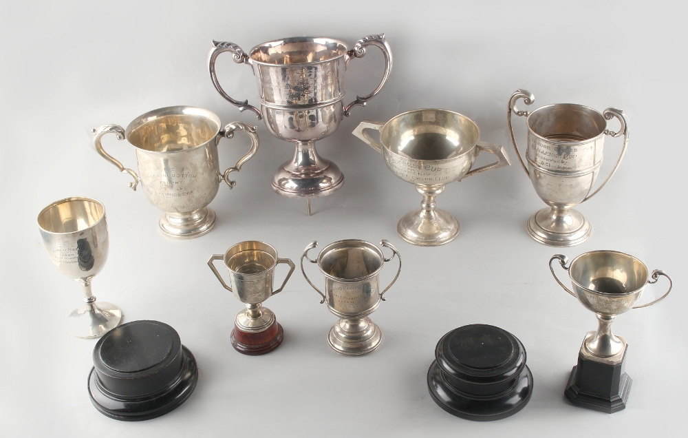 Property of a gentleman - a group of eight silver trophy cups, all but one with engraved