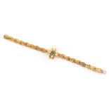 A Victorian unmarked yellow gold emerald & pearl bracelet, with foliate engraved arrowhead links,