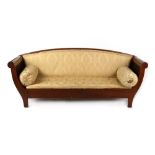 An early 20th century Continental mahogany canape, with carved leaf decorated scroll ends, 84ins. (