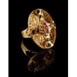 Property of a deceased estate - an Ilias Lalaounis 18ct yellow gold ruby sapphire & diamond ring,