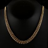 Property of a lady - a heavy 14ct gold graduated chain link necklace, 16.75ins. (42.5cms.) long,