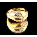 Property of a lady - an 18ct yellow gold & diamond banded ring, set with ten round cut diamonds,