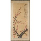 A mid 20th century Chinese painting on paper depicting prunus, with calligraphy & two red seals, the