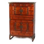 Property of a gentleman - a Korean elm two-part cabinet with an arrangement of drawers & doors,