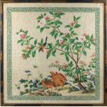 A 19th century Chinese painting on paper depicting two quails & another bird among flowering shrubs,