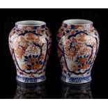 Property of a lady - a pair of late 19th century Japanese Imari vases, each 9.8ins. (25cms.) high (