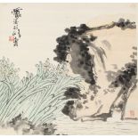 A Chinese scroll painting on paper depicting flowers by a pond, mid / late 20th century, with