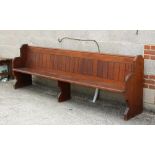 Property of a gentleman - a late 19th / early 20th century pitch pine pew, 110.25ins. (280cms.)