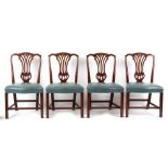 Property of a lady - a set of four Hepplewhite style carved mahogany side chairs, with blue
