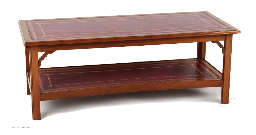 Property of a lady - a reproduction mahogany rectangular two tier coffee table with inset red