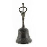 Property of a deceased estate - a bronze hand bell with stylised coronet terminal, 19th century or