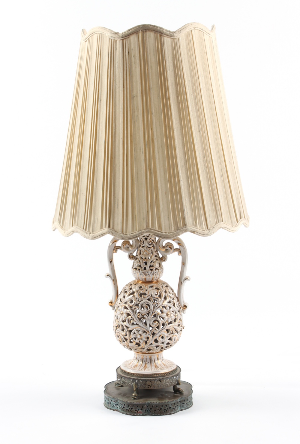 Property of a lady - a large gilt decorated white glazed ceramic table lamp, with pierced brass