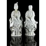 Property of a lady - two Chinese blanc de Chine figures, 19th century, the taller 9.5ins. (24cms.)