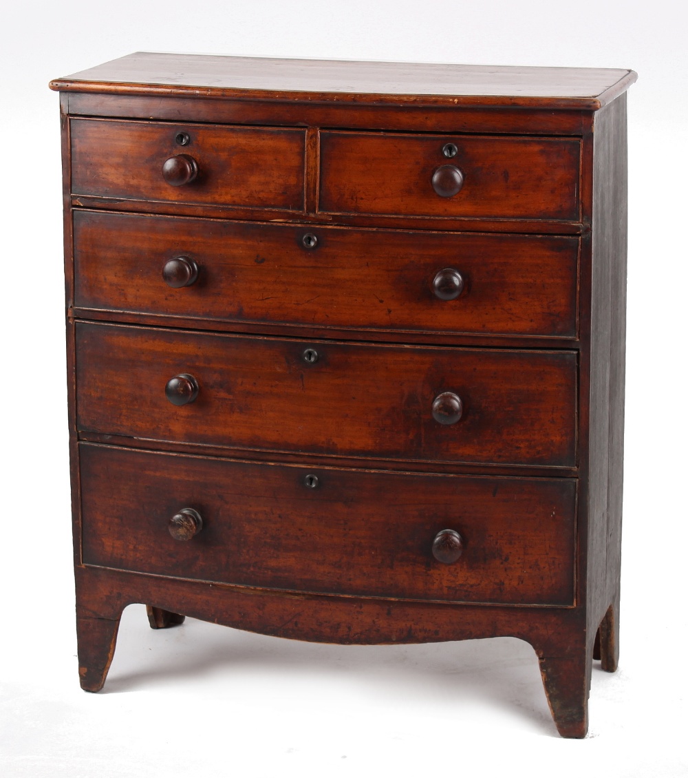 Property of a gentleman - an early 19th century mahogany bow-fronted chest of two short & three long