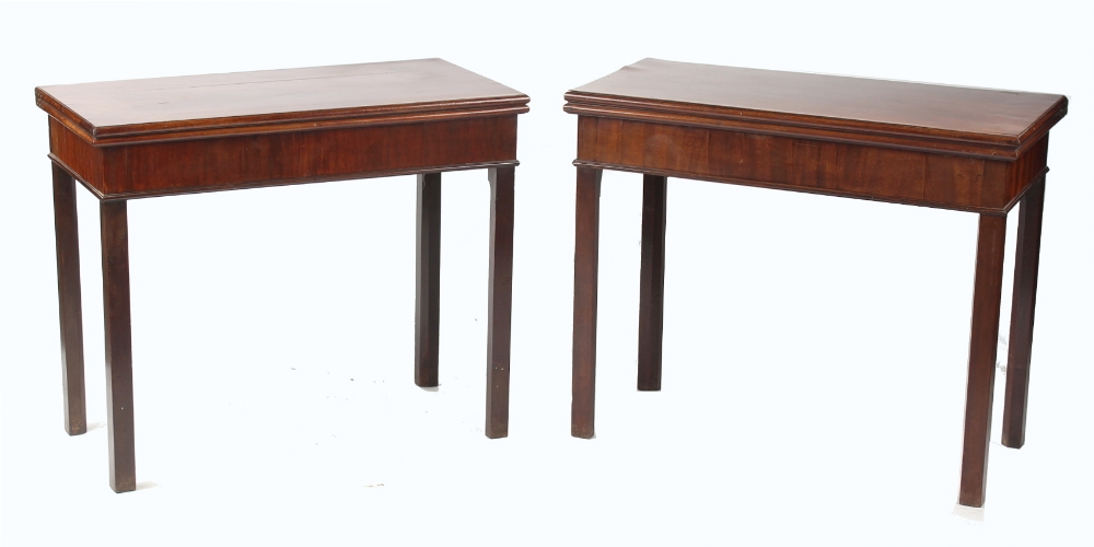 Property of a lady - a near pair of 18th century George III mahogany tea and card tables, with