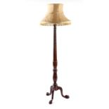 Property of a deceased estate - a carved mahogany standard lamp, adapted from a Victorian bed