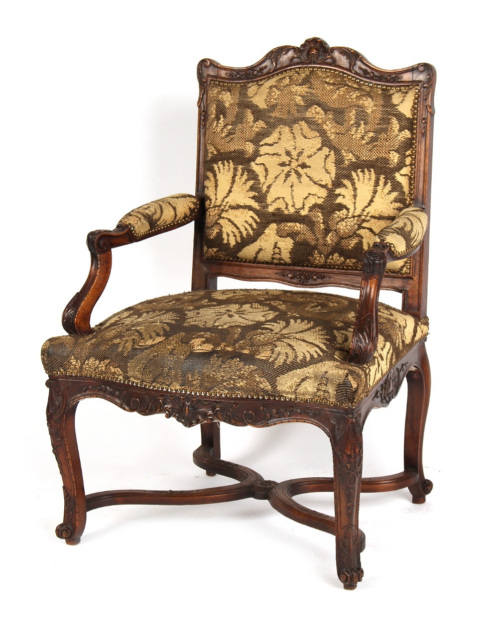 A late 19th century French Louis XIV style carved fruitwood open armchair, with cabriole legs &