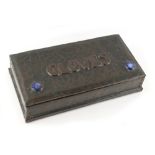 Property of a gentleman - an Art Nouveau embossed copper clad gloves box with Ruskin type bosses (
